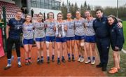 9 March 2024; ATU Sligo coach Ronan McGarrigle, left, ATU Sligo manager Gavin Cawley and ATU Sligo selector Michaela Gaffney with players, from left, Niamh Beggan, Orla Hennessy, Roisin Rodgers, Dearbhile Lynch, Lily Monaghan, Ellis Keane and Laura Conway and the cup after the 2024 Ladies HEC Moynihan Cup final match between Atlantic Technological University Sligo and Mary Immaculate College Limerick at MTU Cork. Photo by Brendan Moran/Sportsfile