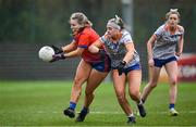 9 March 2024; Liz McGrath of MICL in action against Mia McDonald of ATU Sligo during the 2024 Ladies HEC Moynihan Cup final match between Atlantic Technological University Sligo and Mary Immaculate College Limerick at MTU Cork. Photo by Brendan Moran/Sportsfile