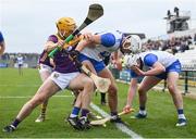 10 March 2024; Damien Reck of Wexford in action against Waterford players Neil Montgomery, centre, and Shane Bennett during the Allianz Hurling League Division 1 Group A match between Waterford and Wexford at Walsh Park in Waterford. Photo by Seb Daly/Sportsfile