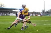 10 March 2024; Damien Reck of Wexford in action against Shane Bennett of Waterford during the Allianz Hurling League Division 1 Group A match between Waterford and Wexford at Walsh Park in Waterford. Photo by Seb Daly/Sportsfile