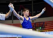 10 March 2024; Jude Gallagher of Ireland celebrates after winning their Men's 57kg Round of 16 bout against Soulaimane Samghouli of Morocco during day eight at the Paris 2024 Olympic Boxing Qualification Tournament at E-Work Arena in Busto Arsizio, Italy. Photo by Ben McShane/Sportsfile