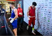 10 March 2024; Jude Gallagher of Ireland is interviewed after winning their Men's 57kg Round of 16 bout against Soulaimane Samghouli of Morocco, right, during day eight at the Paris 2024 Olympic Boxing Qualification Tournament at E-Work Arena in Busto Arsizio, Italy. Photo by Ben McShane/Sportsfile
