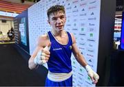 10 March 2024; Jude Gallagher of Ireland celebrates after winning their Men's 57kg Round of 16 bout against Soulaimane Samghouli of Morocco during day eight at the Paris 2024 Olympic Boxing Qualification Tournament at E-Work Arena in Busto Arsizio, Italy. Photo by Ben McShane/Sportsfile