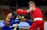 10 March 2024; Owain Harris-Allan of Great Britain, right, in action against Lucas Alexander Fernandez Garcia of Uruguay during their Men's 57kg Round of 16 bout during day eight at the Paris 2024 Olympic Boxing Qualification Tournament at E-Work Arena in Busto Arsizio, Italy. Photo by Ben McShane/Sportsfile