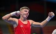 10 March 2024; Owain Harris-Allan of Great Britain celebrates after winning their Men's 57kg Round of 16 bout against Lucas Alexander Fernandez Garcia of Uruguay during day eight at the Paris 2024 Olympic Boxing Qualification Tournament at E-Work Arena in Busto Arsizio, Italy. Photo by Ben McShane/Sportsfile
