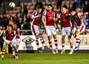 8 March 2024; St Patrick's Athletic players, from left, Chris Forrester, Luke Turner, Joe Redmond and Cian Kavanagh form a wall during the SSE Airtricity Men's Premier Division match between St Patrick's Athletic and Dundalk at Richmond Park in Dublin. Photo by Piaras Ó Mídheach/Sportsfile