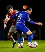 4 March 2024; Anto Breslin of St Patrick's Athletic in action against Connor Parsons of Waterford during the SSE Airtricity Men's Premier Division match between Waterford and St Patrick's Athletic at the Regional Sports Centre in Waterford. Photo by Piaras Ó Mídheach/Sportsfile