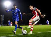 4 March 2024; Brandon Kavanagh of St Patrick's Athletic in action against Grant Horton of Waterford during the SSE Airtricity Men's Premier Division match between Waterford and St Patrick's Athletic at the Regional Sports Centre in Waterford. Photo by Piaras Ó Mídheach/Sportsfile
