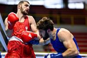 11 March 2024; Mateusz Bereznicki of Poland, left, in action against Patrick Brown of Great Britain during their Men's 92kg Quarterfinals bout during day nine at the Paris 2024 Olympic Boxing Qualification Tournament at E-Work Arena in Busto Arsizio, Italy. Photo by Ben McShane/Sportsfile