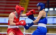 11 March 2024; Grainne Walsh of Ireland, left, in action against Aneta Rygielska of Poland during their Women's 66kg Quarterfinals bout during day nine at the Paris 2024 Olympic Boxing Qualification Tournament at E-Work Arena in Busto Arsizio, Italy. Photo by Ben McShane/Sportsfile