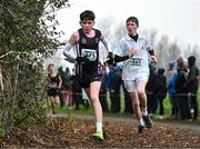 9 March 2024; Conor Looney of PBC Cork, left, competes in the junior boys 3500m during the 123.ie All Ireland Schools Cross Country Championships at Tymon Park in Tallaght, Dublin. Photo by Sam Barnes/Sportsfile