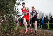 9 March 2024; Matthew Mahony of Midleton CBS, Cork, left, and Robert Coogan of Kilkenny CBS, compete in the junior boys 3500m during the 123.ie All Ireland Schools Cross Country Championships at Tymon Park in Tallaght, Dublin. Photo by Sam Barnes/Sportsfile
