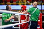 11 March 2024; Grainne Walsh of Ireland, centre, with Ireland coaches Zaur Antia, left, and Damian Kennedy during her Women's 66kg Quarterfinals bout against Aneta Rygielska of Poland during day nine at the Paris 2024 Olympic Boxing Qualification Tournament at E-Work Arena in Busto Arsizio, Italy. Photo by Ben McShane/Sportsfile
