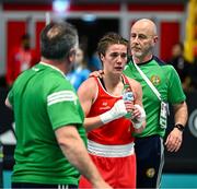 11 March 2024; Grainne Walsh of Ireland, centre, reacts after her defeat against Aneta Rygielska of Poland in her Women's 66kg Quarterfinals bout, with Ireland coaches Zaur Antia, left, and Damian Kennedy during day nine at the Paris 2024 Olympic Boxing Qualification Tournament at E-Work Arena in Busto Arsizio, Italy. Photo by Ben McShane/Sportsfile