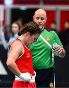 11 March 2024; Grainne Walsh of Ireland, centre, reacts after her defeat against Aneta Rygielska of Poland in her Women's 66kg Quarterfinals bout, with Ireland coach Damian Kennedy during day nine at the Paris 2024 Olympic Boxing Qualification Tournament at E-Work Arena in Busto Arsizio, Italy. Photo by Ben McShane/Sportsfile