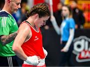11 March 2024; Grainne Walsh of Ireland, centre, reacts after her defeat against Aneta Rygielska of Poland in her Women's 66kg Quarterfinals bout during day nine at the Paris 2024 Olympic Boxing Qualification Tournament at E-Work Arena in Busto Arsizio, Italy. Photo by Ben McShane/Sportsfile