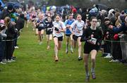 9 March 2024; Julia Butler, left, and Olivia Butler of Alexandra College, Dublin compete in the minor girls 2000m during the 123.ie All Ireland Schools Cross Country Championships at Tymon Park in Tallaght, Dublin. Photo by Sam Barnes/Sportsfile