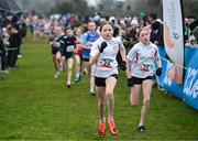 9 March 2024; Julia Butler, left, and Olivia Butler of Alexandra College, Dublin compete in the minor girls 2000m during the 123.ie All Ireland Schools Cross Country Championships at Tymon Park in Tallaght, Dublin. Photo by Sam Barnes/Sportsfile