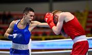 11 March 2024; Kieran MacDonald of Great Britain, right, in action against Saken Bibossinov of Kazakhstan during their Men's 51kg Quarterfinals bout during their Men's 57kg Quarterfinals bout during day nine at the Paris 2024 Olympic Boxing Qualification Tournament at E-Work Arena in Busto Arsizio, Italy. Photo by Ben McShane/Sportsfile