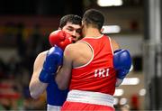 11 March 2024; Nurbek Oralbay of Kazakhstan, left, in action against Kelyn Cassidy of Ireland  during their Men's 80kg Quarterfinals bout during day nine at the Paris 2024 Olympic Boxing Qualification Tournament at E-Work Arena in Busto Arsizio, Italy. Photo by Ben McShane/Sportsfile