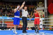 11 March 2024; Nurbek Oralbay of Kazakhstan, left, is declared victorius against Kelyn Cassidy of Ireland in their Men's 80kg Quarterfinals bout against Nurbek Oralbay of Kazakhstan during day nine at the Paris 2024 Olympic Boxing Qualification Tournament at E-Work Arena in Busto Arsizio, Italy. Photo by Ben McShane/Sportsfile