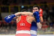 11 March 2024; Nurbek Oralbay of Kazakhstan, right, in action against Kelyn Cassidy of Ireland during their Men's 80kg Quarterfinals bout during day nine at the Paris 2024 Olympic Boxing Qualification Tournament at E-Work Arena in Busto Arsizio, Italy. Photo by Ben McShane/Sportsfile