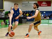 12 March 2024; Oisin Flynn of MICL in action against Adrien Michaux of TUS Midlands during the Basketball Ireland College Division 3 Men's finals match between Technological University of the Shannon, Midlands and Mary Immaculate College Limerick at National Basketball Arena Tallaght. Photo by Tyler Miller/Sportsfile