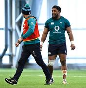 12 March 2024; Bundee Aki, right, and assistant coach Mike Catt during an Ireland rugby squad training session at the IRFU High Performance Centre at the Sports Ireland Campus in Dublin. Photo by Brendan Moran/Sportsfile