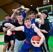 12 March 2024; Oisin Tunnry of MICL, centre, celebrates after his side's victory in the Basketball Ireland College Division 3 Men's finals match between Technological University of the Shannon, Midlands and Mary Immaculate College Limerick at National Basketball Arena Tallaght. Photo by Tyler Miller/Sportsfile