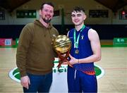 12 March 2024; Oisin Flynn of MICL is presented with the player of match award after the Basketball Ireland College Division 3 Men's finals match between Technological University of the Shannon, Midlands and Mary Immaculate College Limerick at National Basketball Arena Tallaght. Photo by Tyler Miller/Sportsfile