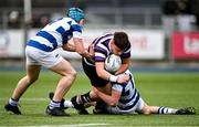 12 March 2024; Daniel McKenna of Terenure College is tackled by Eoghan Rowlands, left, and Paddy Scally of Blackrock College during the Bank of Ireland Schools Junior Cup semi-final match between Blackrock College and Terenure College at Energia Park in Dublin. Photo by Sam Barnes/Sportsfile