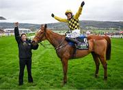 12 March 2024; Jockey Paul Townend celebrates aboard State Man with groom Rachel Roberts after winning the Unibet Champion Hurdle Challenge Trophy on day one of the Cheltenham Racing Festival at Prestbury Park in Cheltenham, England. Photo by David Fitzgerald/Sportsfile