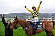 12 March 2024; Jockey Paul Townend celebrates aboard State Man with groom Rachel Robins after winning the Unibet Champion Hurdle Challenge Trophy on day one of the Cheltenham Racing Festival at Prestbury Park in Cheltenham, England. Photo by David Fitzgerald/Sportsfile