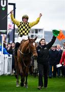 12 March 2024; Jockey Paul Townend celebrates aboard State Man with groom Rachel Robins after winning the Unibet Champion Hurdle Challenge Trophy on day one of the Cheltenham Racing Festival at Prestbury Park in Cheltenham, England. Photo by Harry Murphy/Sportsfile