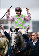 12 March 2024; Jockey Paul Townend celebrates aboard Lossiemouth after winning the Close Brothers Mares' Hurdle on day one of the Cheltenham Racing Festival at Prestbury Park in Cheltenham, England. Photo by Harry Murphy/Sportsfile