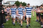 12 March 2024; Blackrock College players, from left, Patrick Agnew, George Eggers and Dan Noonan leave the field dejected after their side's defeat in the Bank of Ireland Schools Junior Cup semi-final match between Blackrock College and Terenure College at Energia Park in Dublin. Photo by Sam Barnes/Sportsfile