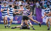 12 March 2024; Lucas Hill of Blackrock College is tackled by Aaron Dillon of Terenure College during the Bank of Ireland Schools Junior Cup semi-final match between Blackrock College and Terenure College at Energia Park in Dublin. Photo by Sam Barnes/Sportsfile