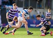 12 March 2024; Lucas Hill of Blackrock College is tackled by Ewan McGinty, left, and Tommy Smyth of Terenure College during the Bank of Ireland Schools Junior Cup semi-final match between Blackrock College and Terenure College at Energia Park in Dublin. Photo by Sam Barnes/Sportsfile