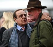 13 March 2024; Owner Maurice Manasseh, left, and trainer Willie Mullins celebrate after sending out Ballyburn to win the Gallagher Novices' Hurdle on day two of the Cheltenham Racing Festival at Prestbury Park in Cheltenham, England. Photo by David Fitzgerald/Sportsfile