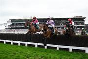 13 March 2024; Stay Away Fay, with Harry Cobden up, and Monty's Star, with Rachael Blackmore up, left, jump the second fence during the Brown Advisory Novices' Chase on day two of the Cheltenham Racing Festival at Prestbury Park in Cheltenham, England. Photo by Harry Murphy/Sportsfile
