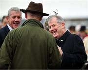 13 March 2024; Owner JP McManus, right, celebrates with trainer Willie Mullins after Fact To File won the Brown Advisory Novices' Chase on day two of the Cheltenham Racing Festival at Prestbury Park in Cheltenham, England. Photo by David Fitzgerald/Sportsfile