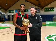 13 March 2024; Matthew McClain of Griffith College Dublin is presented with his MVP award by Niall McDermott of Basketball Ireland after the Basketball Ireland Men's Colleges Division 1 final match between TUS Midwest and Griffith College Dublin at National Basketball Arena in Tallaght, Dublin. Photo by Piaras Ó Mídheach/Sportsfile