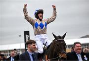 13 March 2024; Jockey Rachael Blackmore celebrates aboard Captain Guinness after winning the Champion Chase on day two of the Cheltenham Racing Festival at Prestbury Park in Cheltenham, England. Photo by David Fitzgerald/Sportsfile