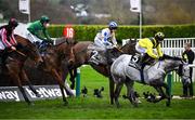 13 March 2024; Captain Guinness, with Rachael Blackmore up, 2, trails Elixir De Nutz, with Freddie Gingell up, who pulled up, as they jump the last on their way to winning the Champion Chase on day two of the Cheltenham Racing Festival at Prestbury Park in Cheltenham, England. Photo by David Fitzgerald/Sportsfile