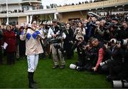 13 March 2024; Jockey Rachael Blackmore celebrates with the trophy after winning the Champion Chase on Captain Guinness during day two of the Cheltenham Racing Festival at Prestbury Park in Cheltenham, England. Photo by Harry Murphy/Sportsfile