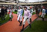 13 March 2024; Jockeys walk out ahead of the Johnny Henderson Grand Annual Challenge Cup Handicap Chase on day two of the Cheltenham Racing Festival at Prestbury Park in Cheltenham, England. Photo by David Fitzgerald/Sportsfile