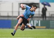 13 March 2024; Joshua Divilly of St Michael’s College is tackled by William Kelly of St Mary’s College during the Bank of Ireland Schools Junior Cup semi-final match between St Michael's College and St Mary's College at Energia Park in Dublin. Photo by Daire Brennan/Sportsfile