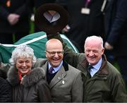 13 March 2024; Trainer Willie Mullins, right, celebrates with winning connections and his wife Jackie, left, after sending out Jasmin De Vaux to win the Weatherbys Champion Bumper, his hundreth Cheltenham winner, on day two of the Cheltenham Racing Festival at Prestbury Park in Cheltenham, England. Photo by David Fitzgerald/Sportsfile