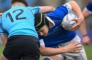 13 March 2024; Rob Flaherty of St Mary’s College is tackled by James McMahon of St Michael’s College during the Bank of Ireland Schools Junior Cup semi-final match between St Michael's College and St Mary's College at Energia Park in Dublin. Photo by Daire Brennan/Sportsfile