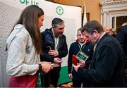 13 March 2024; Olympians and Olympic medallists, from left, Annalise Murphy, Kenneth Egan and Paddy Barnes, admire the medal of David Wilkins, right, at a reception in Trinity College to celebrate 100 years of Team Ireland’s participation at the Olympics, and to officially reveal the names of the athletes who have represented Ireland in the Olympic Games since Ireland first competed as a nation in Paris 1924. Photo by Brendan Moran/Sportsfile